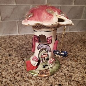 Blue Sky Mushroom Mansion by Heather Goldminc 2002